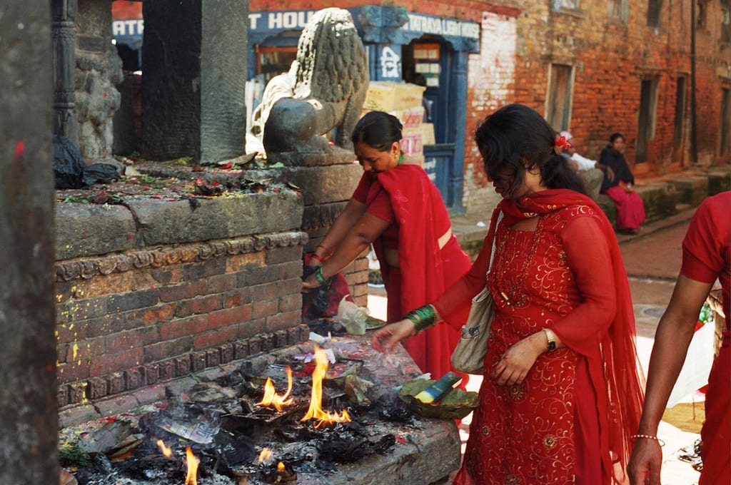 women nepal puja offerings