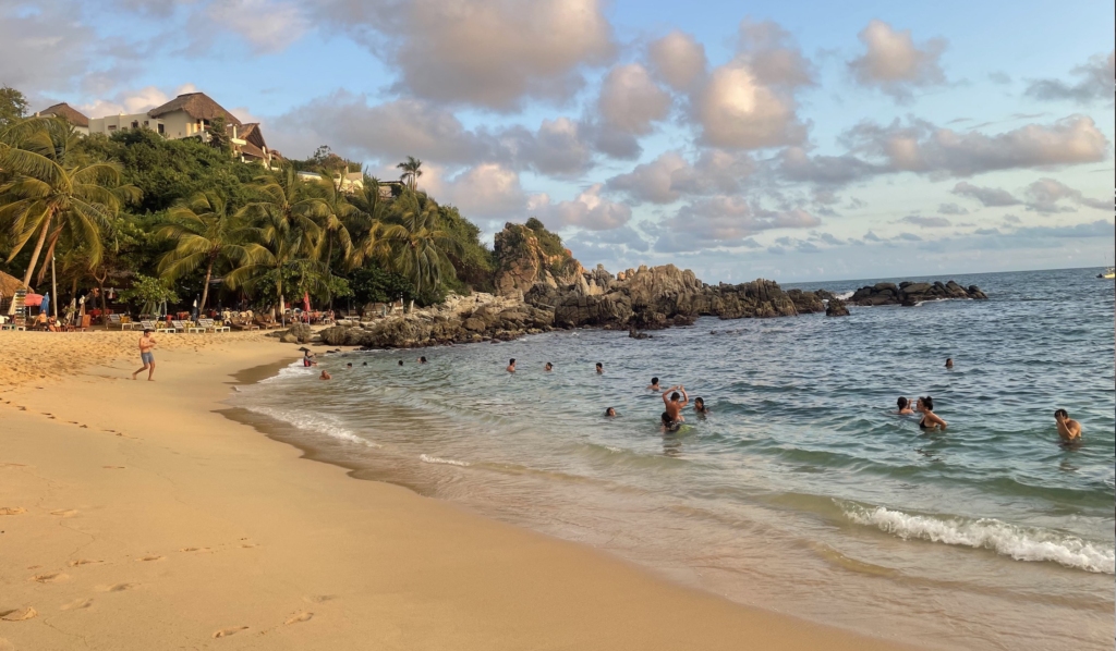 Puerto Escondido, Mexico, is a stunning beach paradise known for its golden sands, crystal-clear waters, and vibrant surf culture.