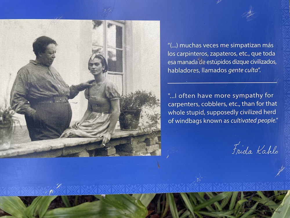 Frida Kahlo with Diego Riveras in her garden