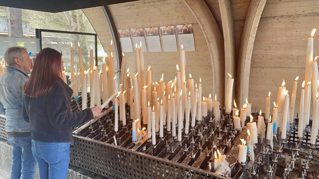 lourdes france lighting candles