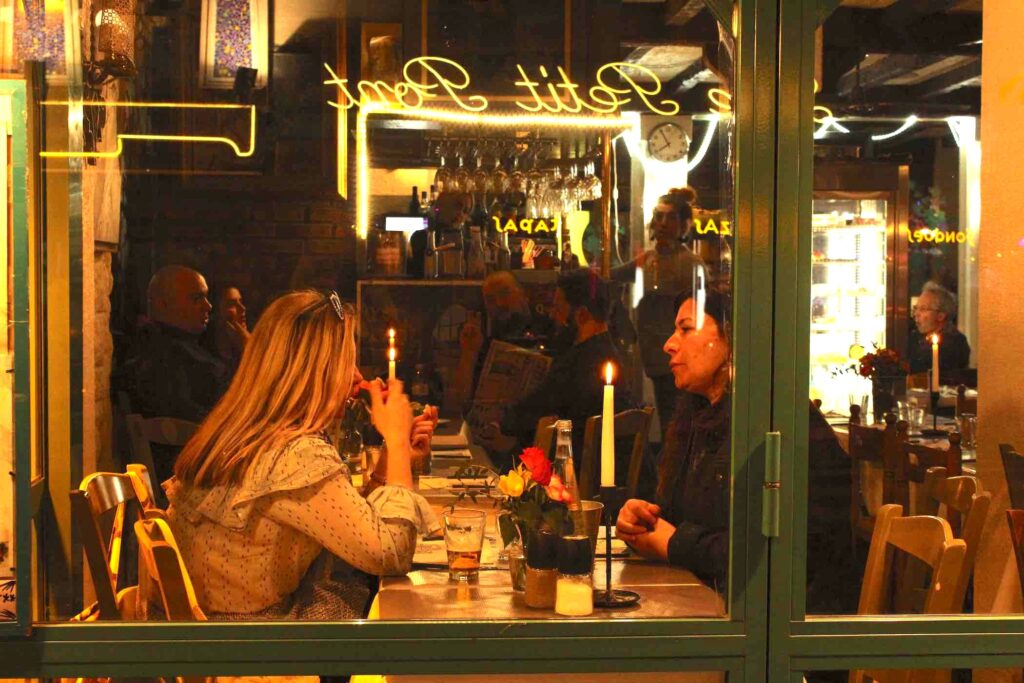 paris france two women dining candlelight